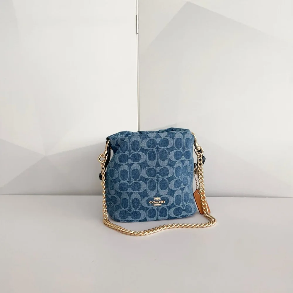 Coach Denim Signature Mini Drawstring Bucket Crossbody Bag